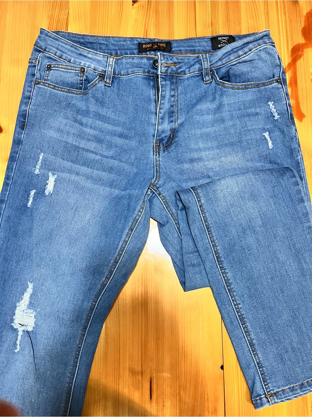 Ring of Fire Men's Light Blue Slim Jeans with Distressed Accents